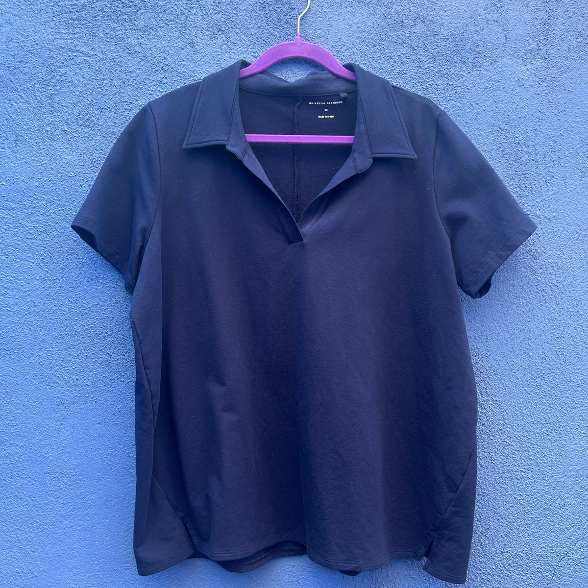universal standard navy jersey polo