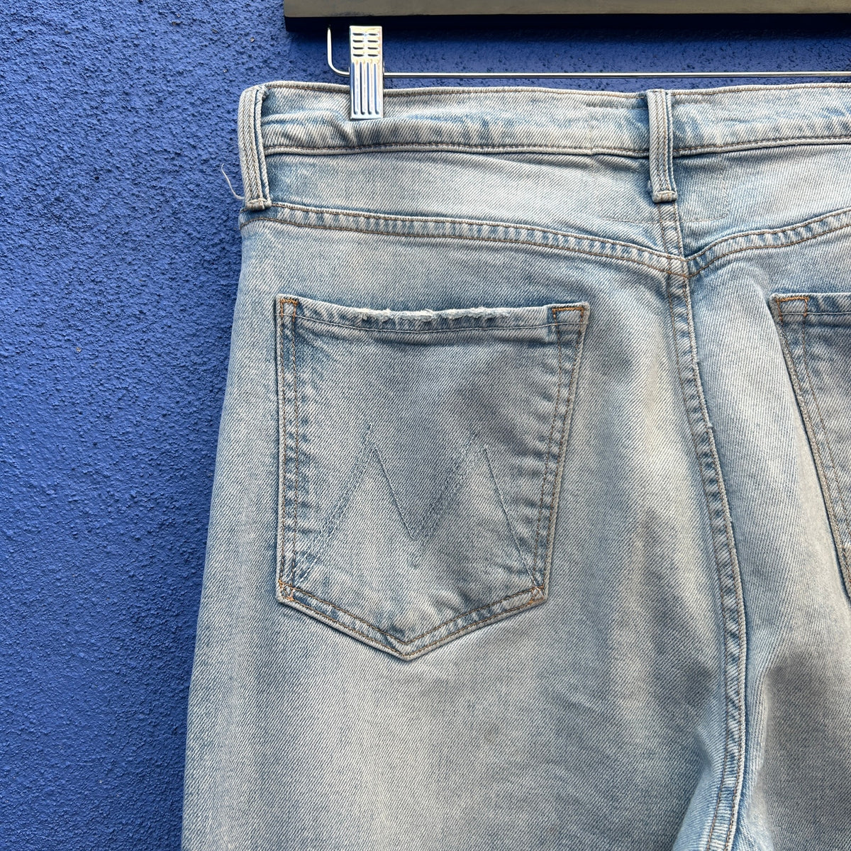 mother the tripper light washed distressed jeans